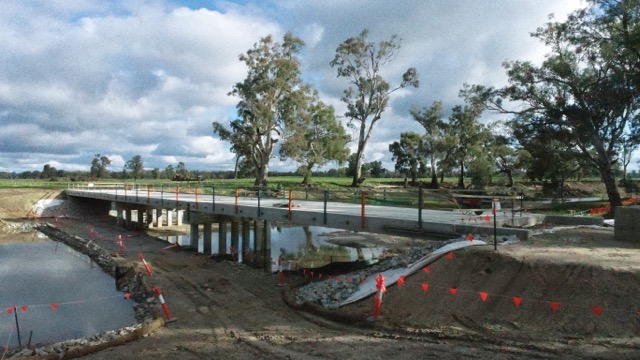 Wide colour view of a bridge spanning Bullatale Creek on Brefni’s Seven Bridges project